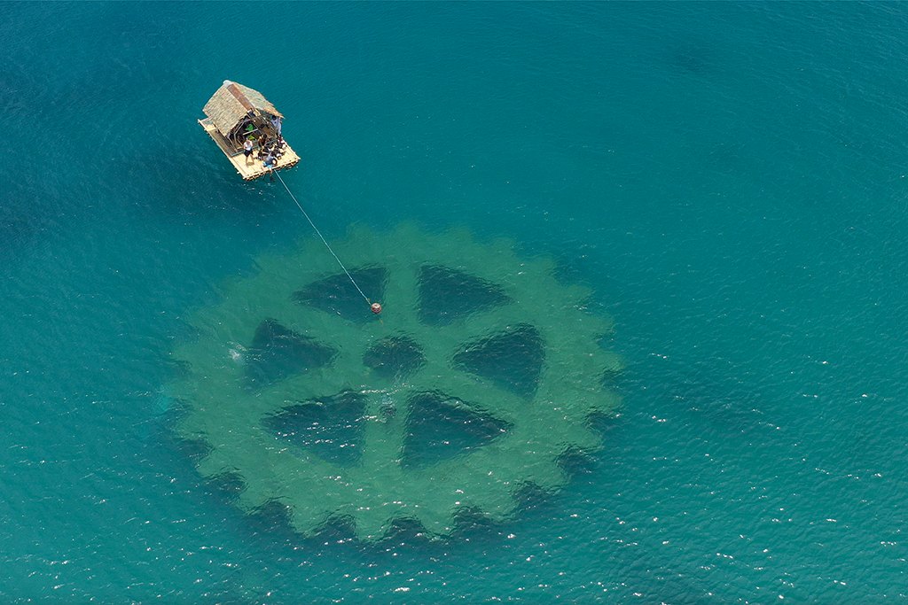 An aerial view of the artificial reef off Atimonan, Philippines, built in the shape of the Rotary wheel
