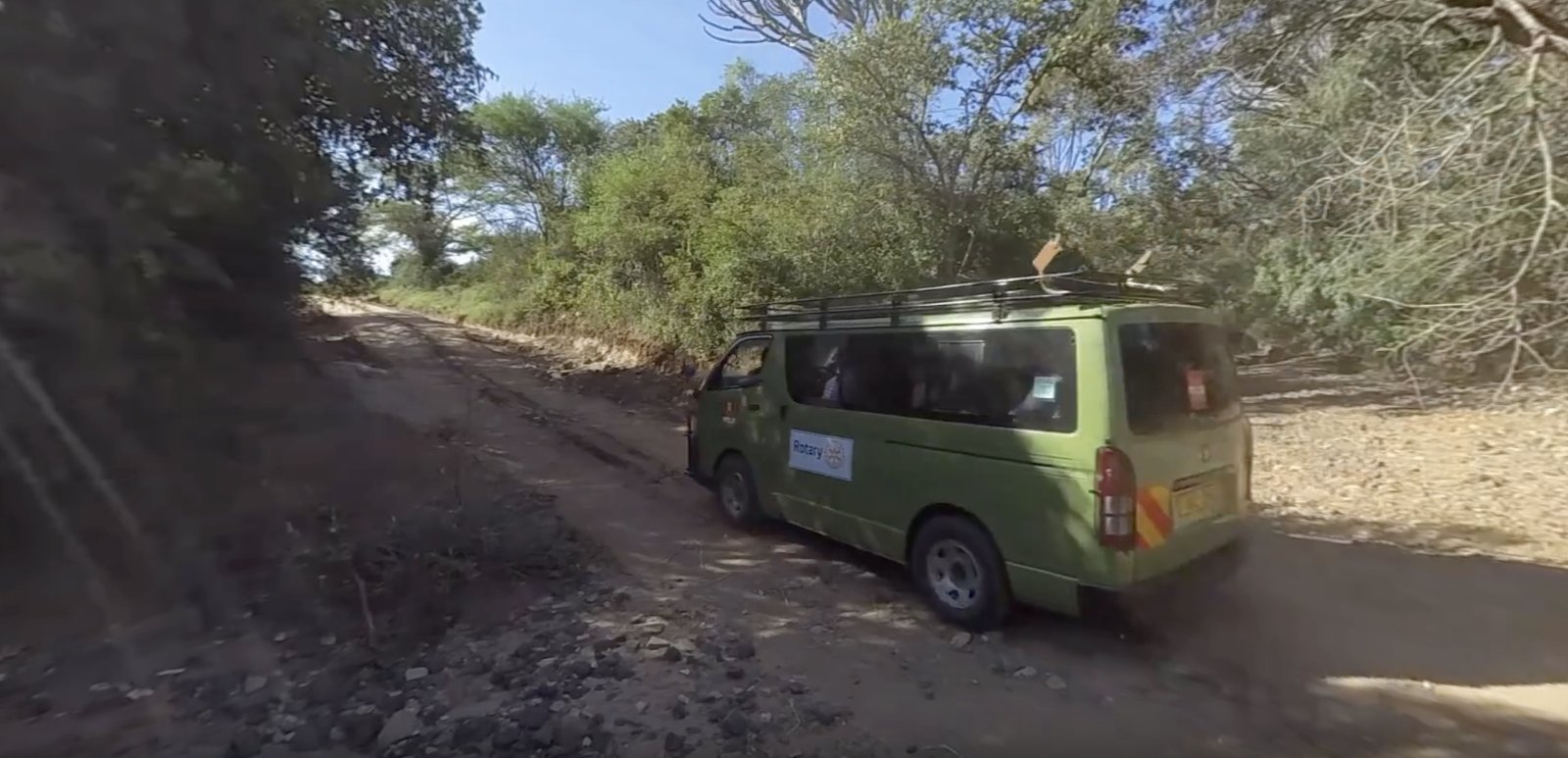 Continuing by vehicle on rough mountain roads